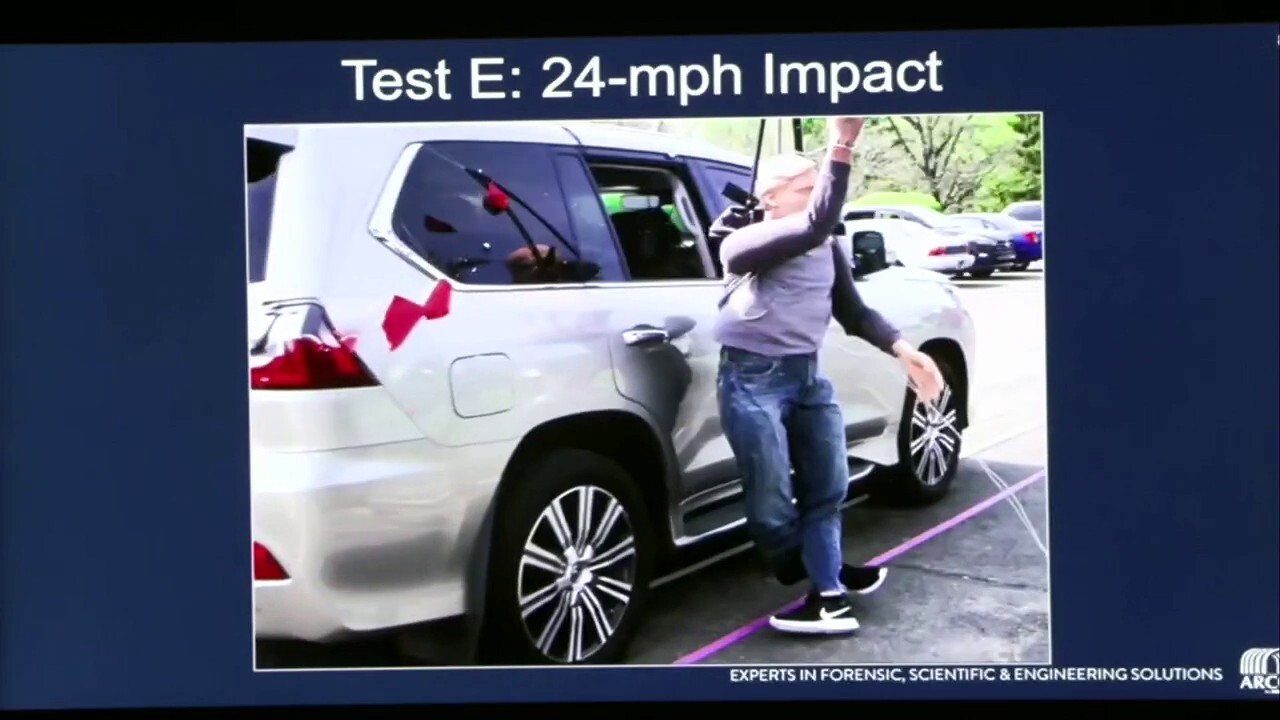 Crash expert plays video reconstruction of Lexus SUV on crash dummy