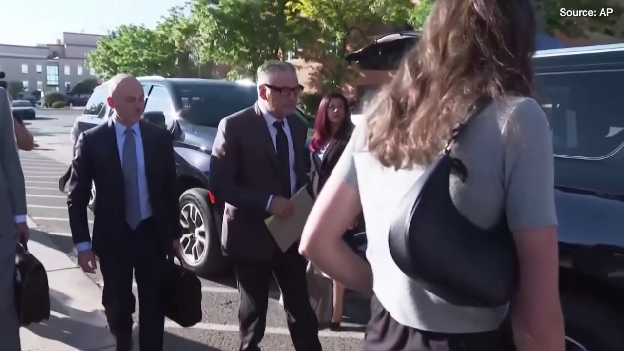 Alec Baldwin and his wife, Hilaria Baldwin, arrive for the first day of jury selection in 'Rust' shooting trial