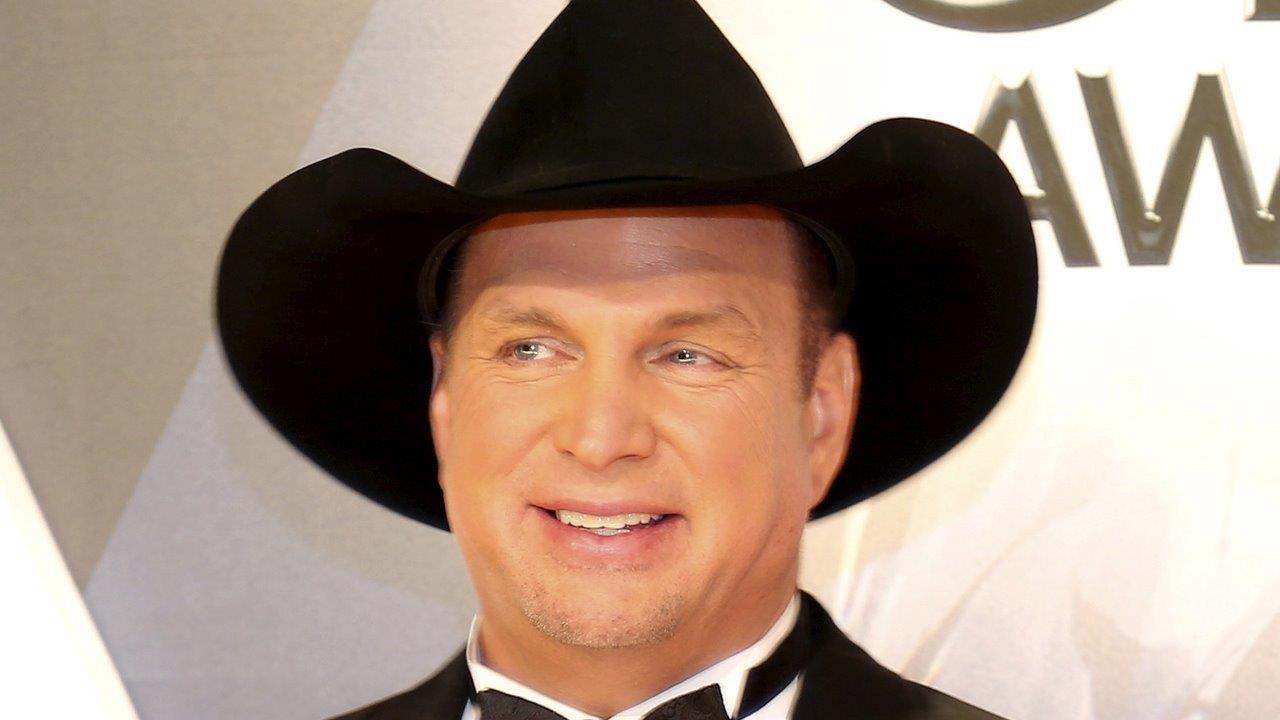Garth Brooks fesses up to why he won't sing for Trump