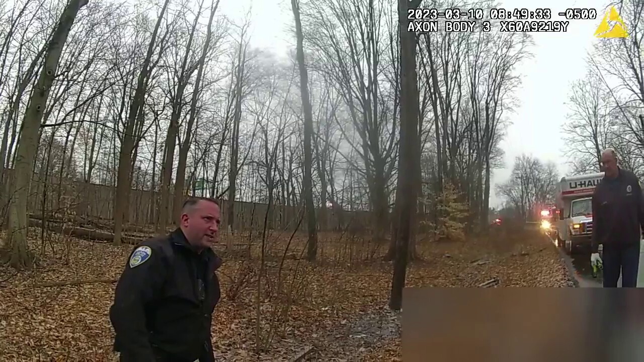 Akron, Ohio police bodycam footage shows neighbors reacting to homicide victims found bound and gagged