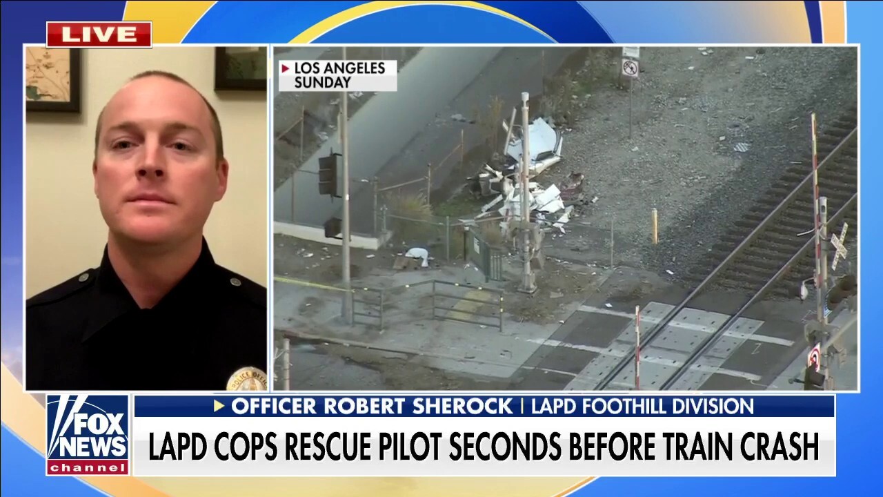 Los Angeles cop recalls selfless rescue of downed pilot from oncoming train: 'I wasn’t worried about myself'
