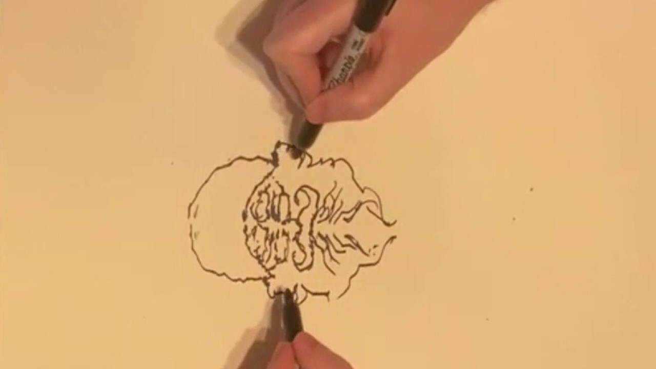 Artist brings holiday cheer with live drawing!