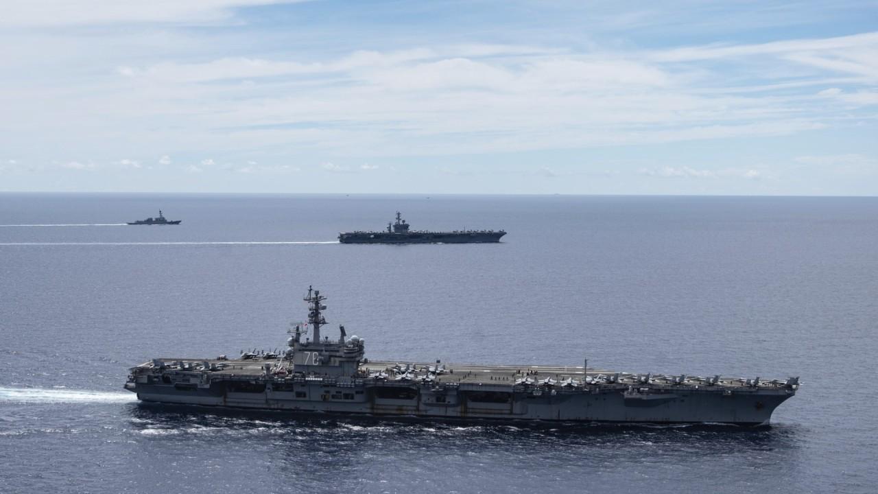 US aircraft carriers return to contested South China Sea