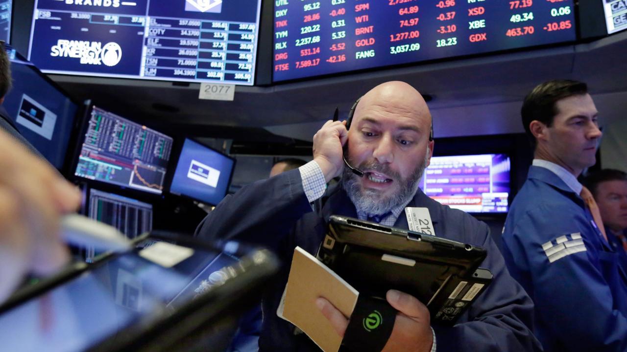 Stocks close higher as investors shrug off trade tensions