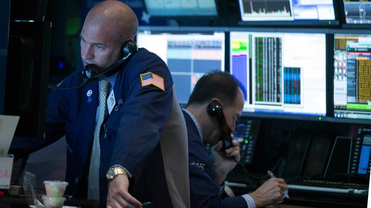 Dow tops 17K for first time since January 6