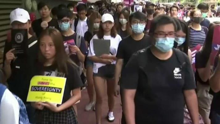 Hong Kong face mask ban prompts more protests