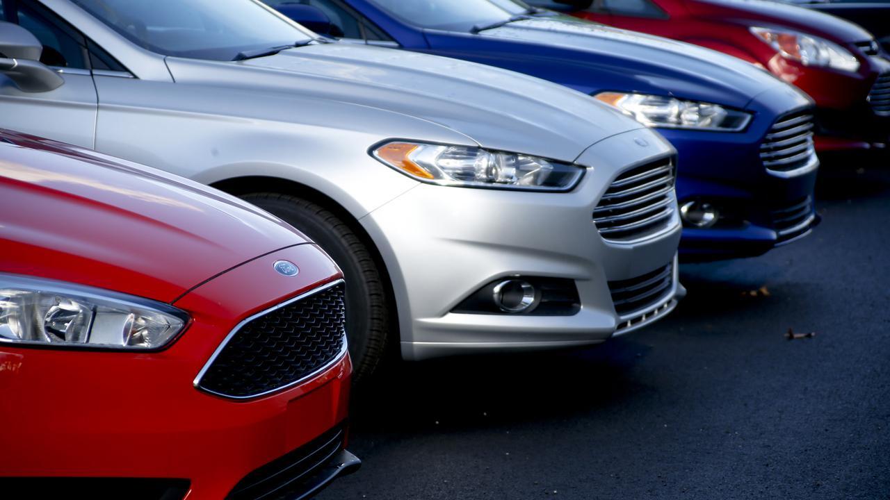 Will car dealers' inventory overload mean good deals for consumers?
