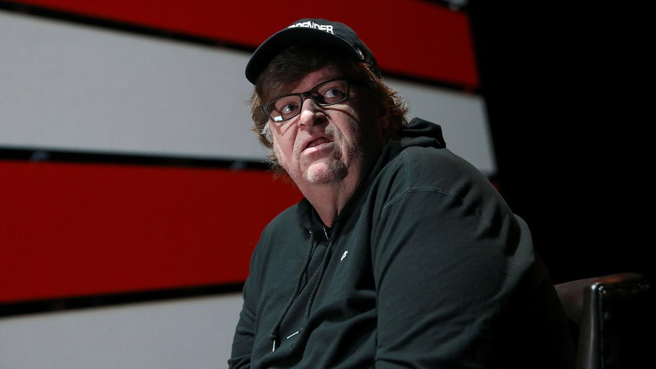 Michael Moore attends Russia-sponsored anti-Trump rally