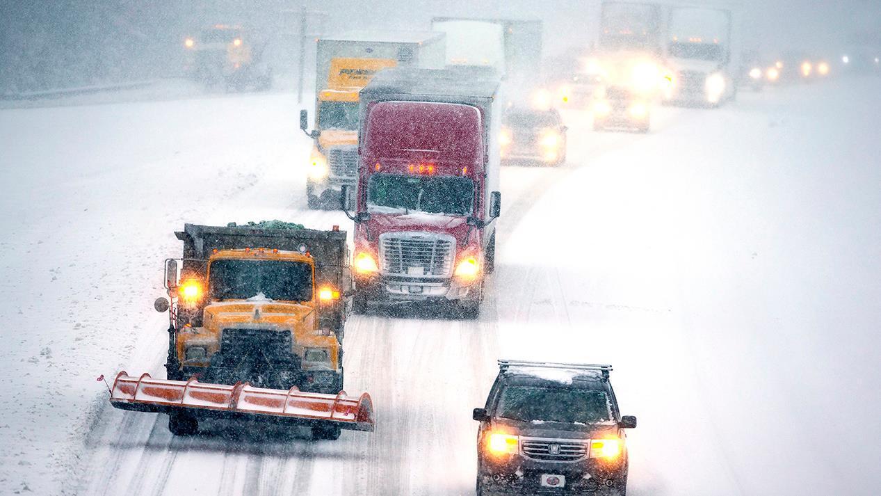 Storm slams Southeast shutting down airports, businesses, schools