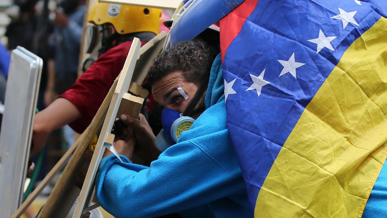 Socialist Venezuelan government struggles to maintain control