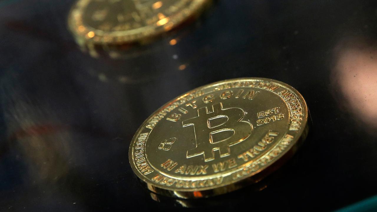 Bitcoin plunges, fueling fears of bubble