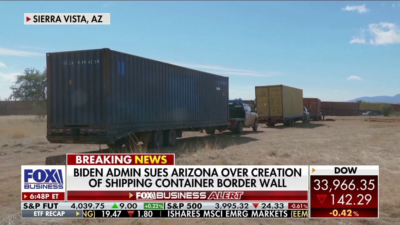 Biden administration sues Arizona over shipping container border wall