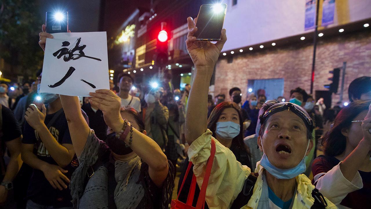 Hong Kong protesters celebrate pro-democracy landslide