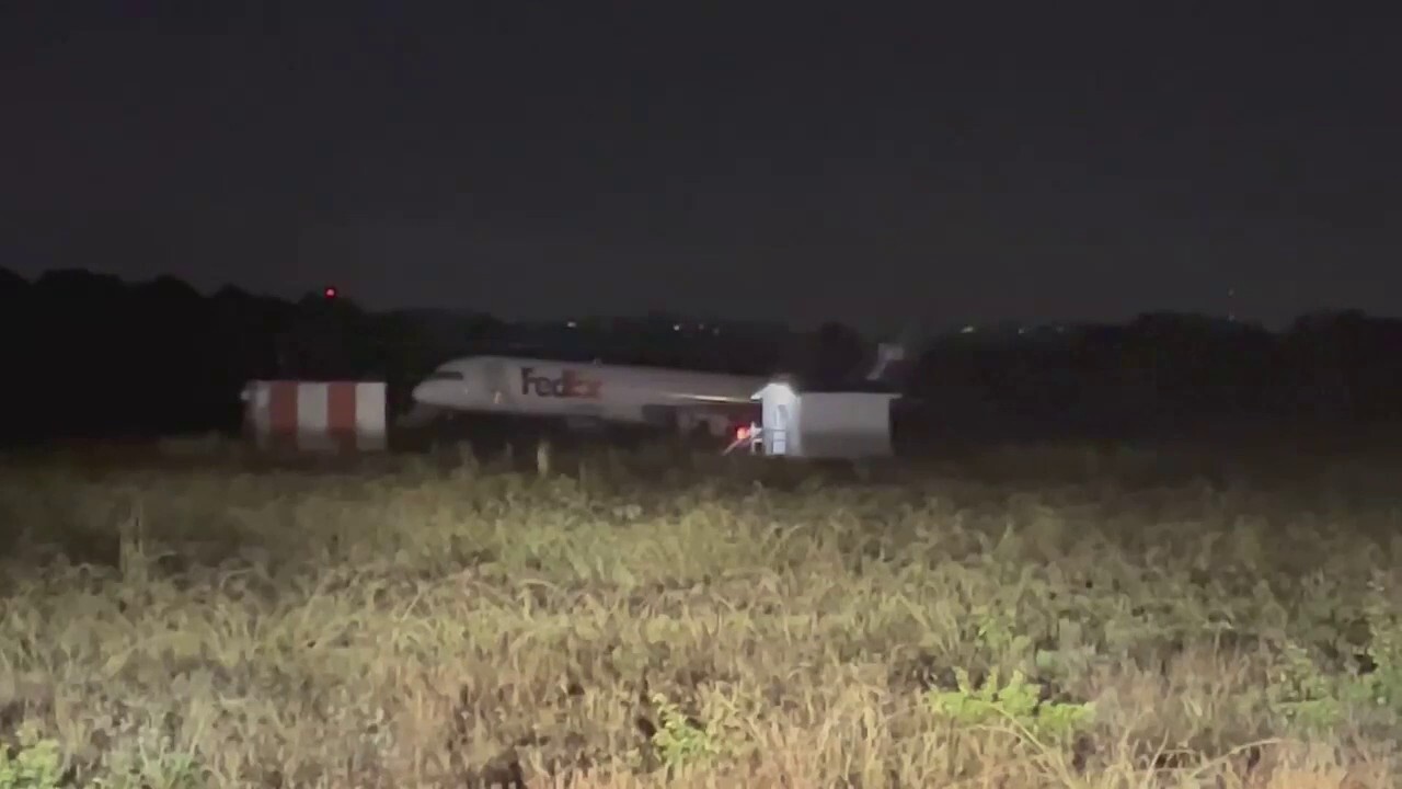 A FedEx cargo plane skidded off the runway at Chattanooga Regional Airport in Tennessee late Wednesday night. (Credit: WTVC)