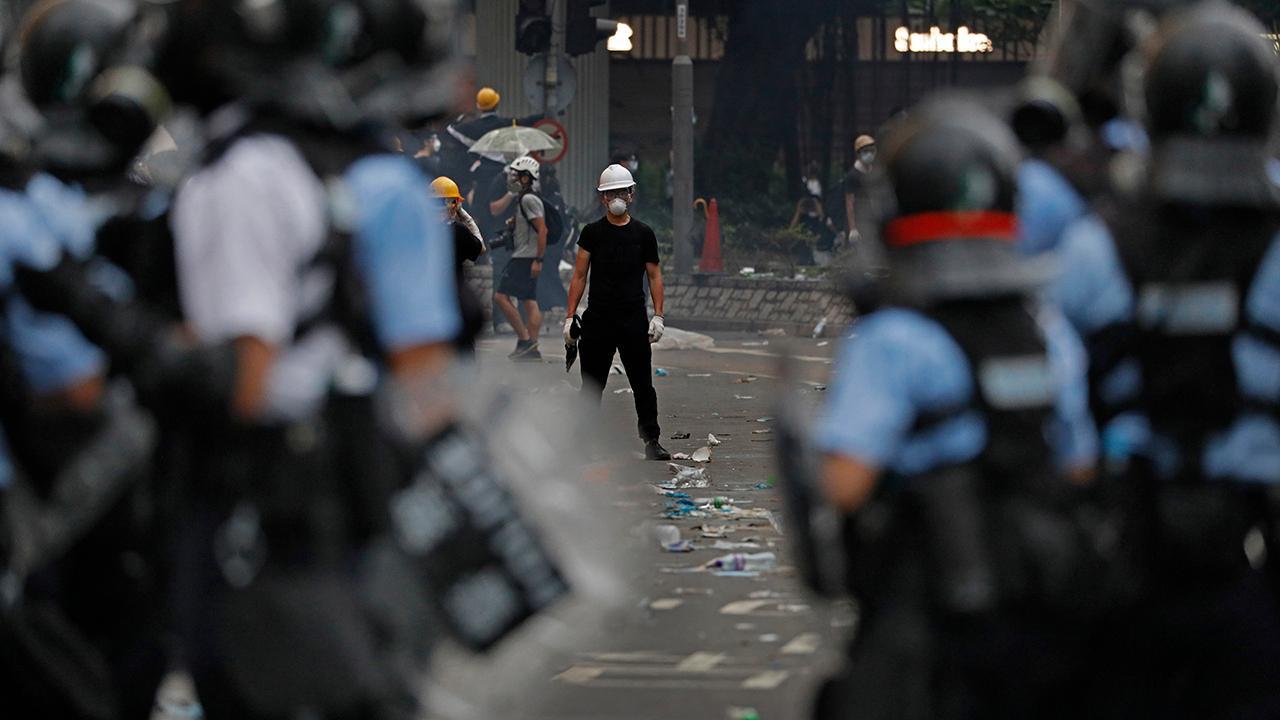 Protesters clash with police in Hong Kong