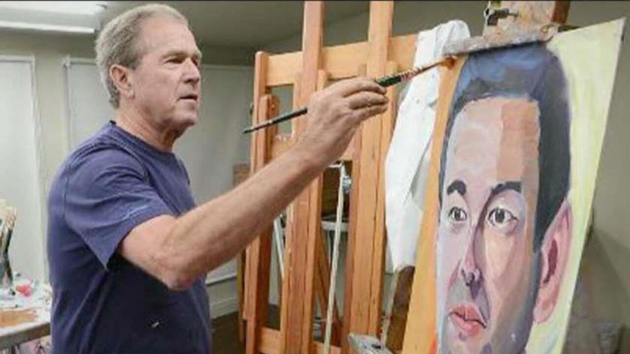 President George W. Bush honoring wounded veterans with portraits