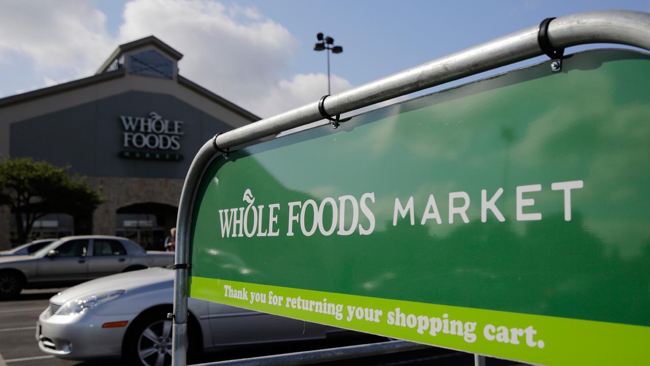 Critics sound anti-trust alarm over Amazon-Whole Foods deal
