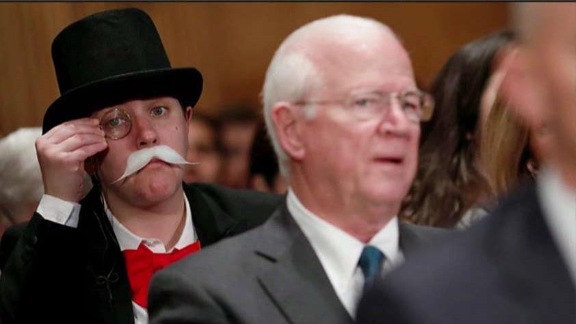 'Monopoly Man' takes on Equifax