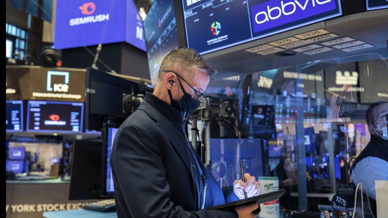 Stocks open lower ahead of earnings season