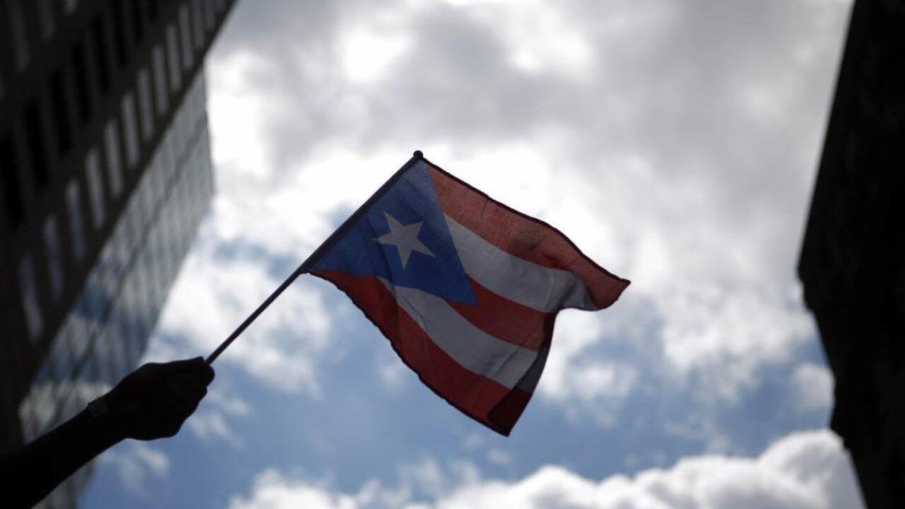 Puerto Rico avoids default, warns of shrinking funds