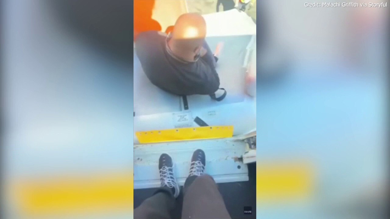 Passengers onboard a U.K. flight were forced to evacuate down emergency slides after vape explodes on plane, filling the cabin with smoke. (Credit: Malachi Griffith via Storyful)