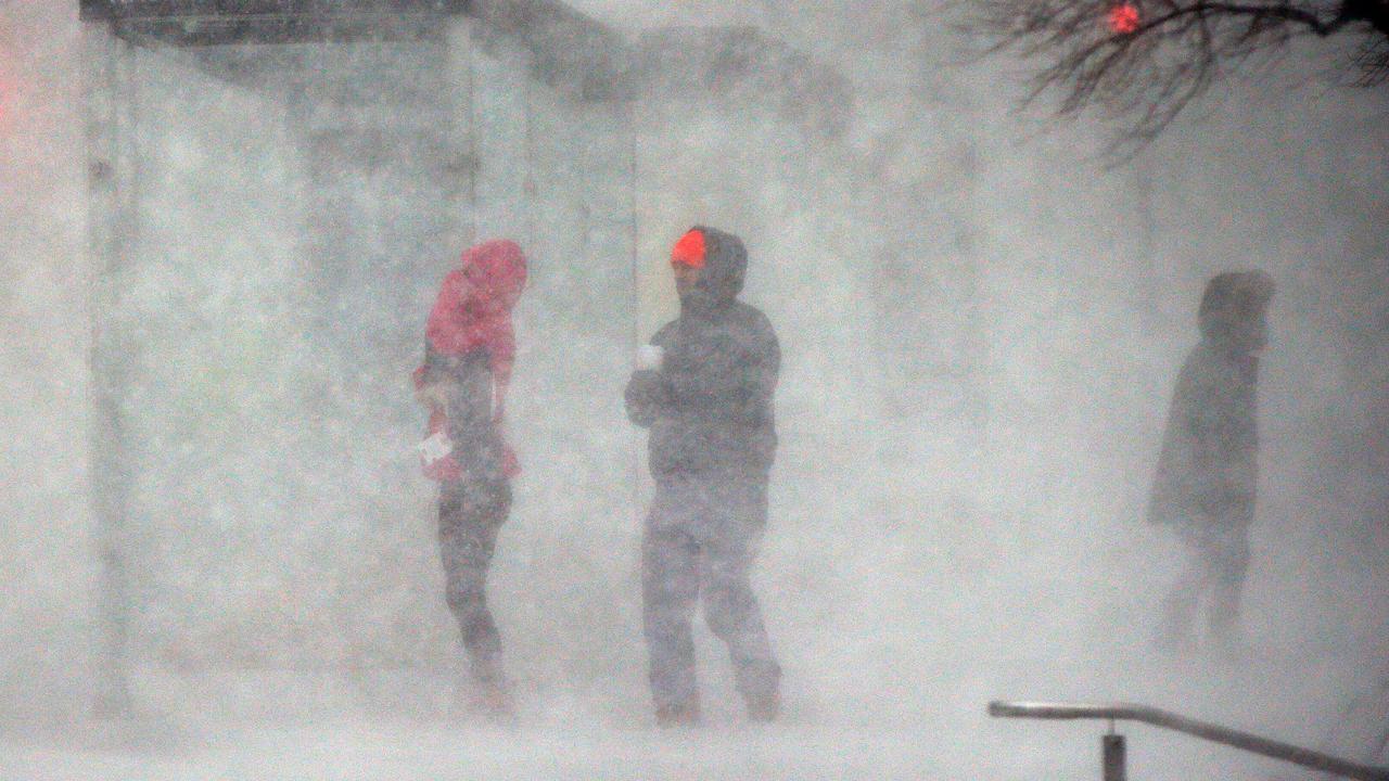 ‘Bomb cyclone’ blows off FBN reporter’s hat 