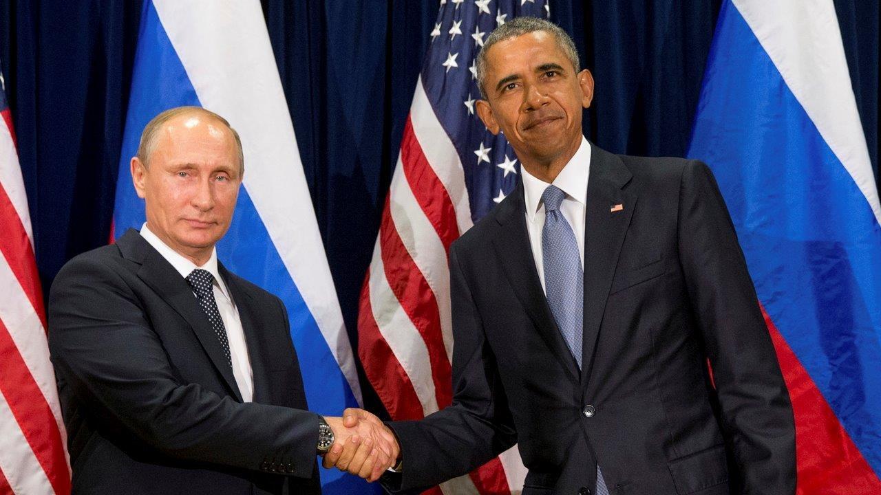 Obama warns Russia of retaliation over hacking
