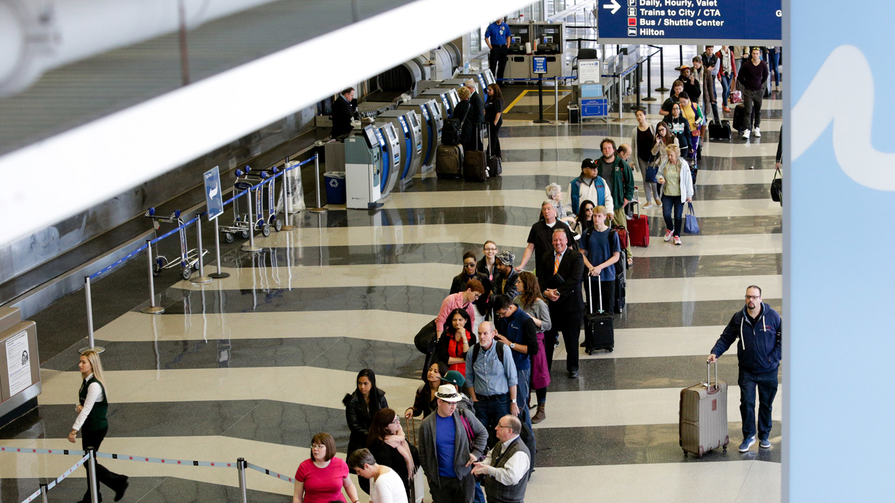 What is causing the massive travel delays at airports?