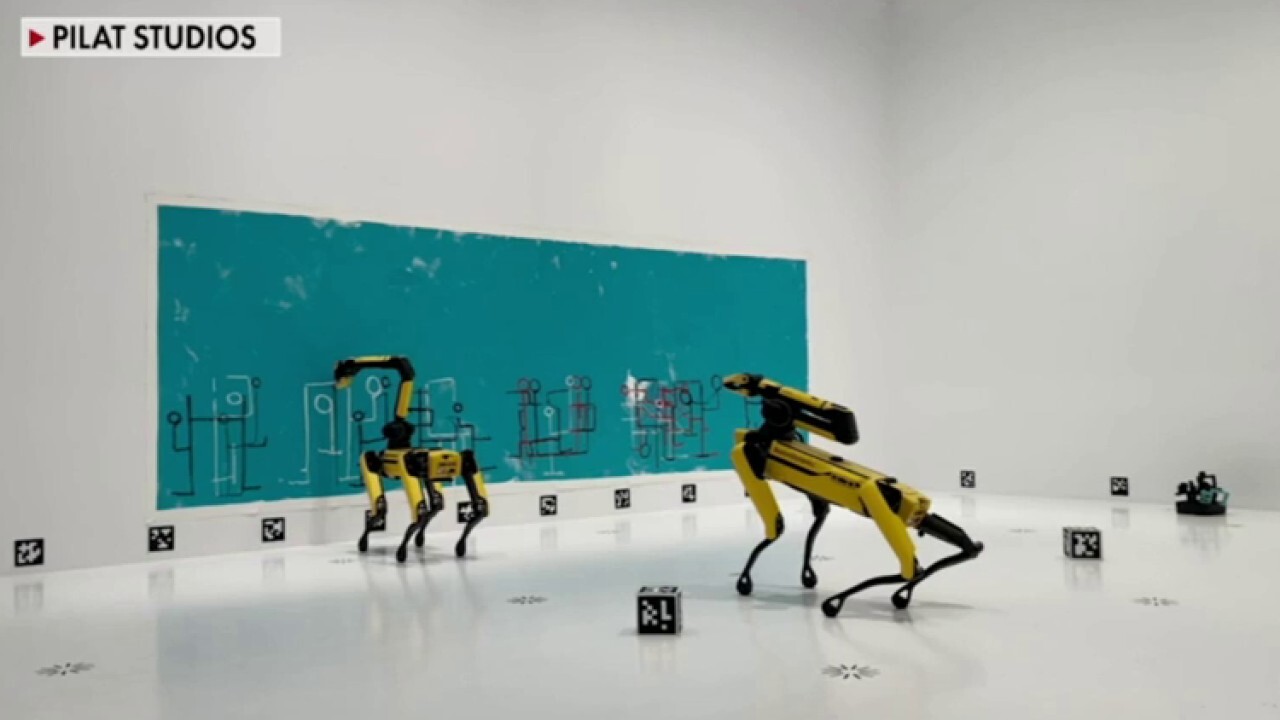 Artist trains robot dogs to create works of art through AI technology