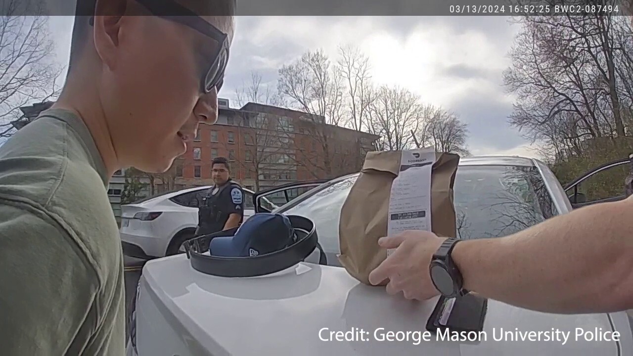 George Mason University Police Sergeant Ryan Grant completed a food order after arresting a delivery driver. (Credit: George Mason University Police)