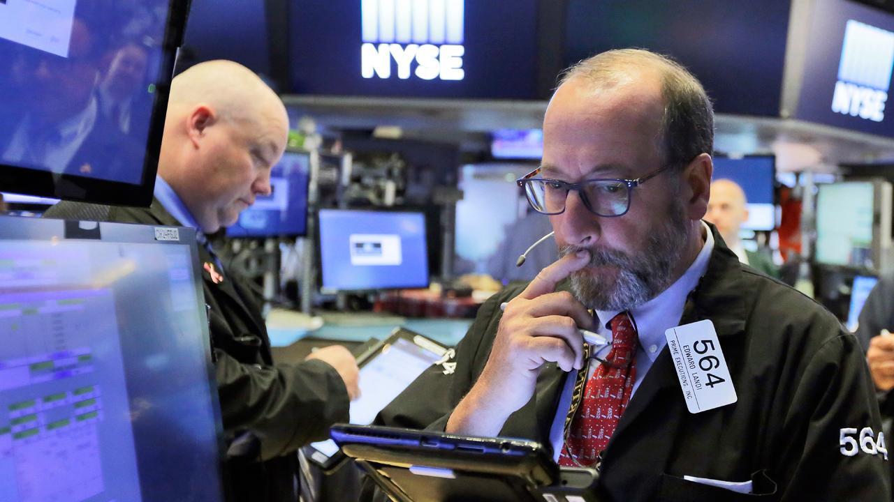 Stock market mixed as financials slide