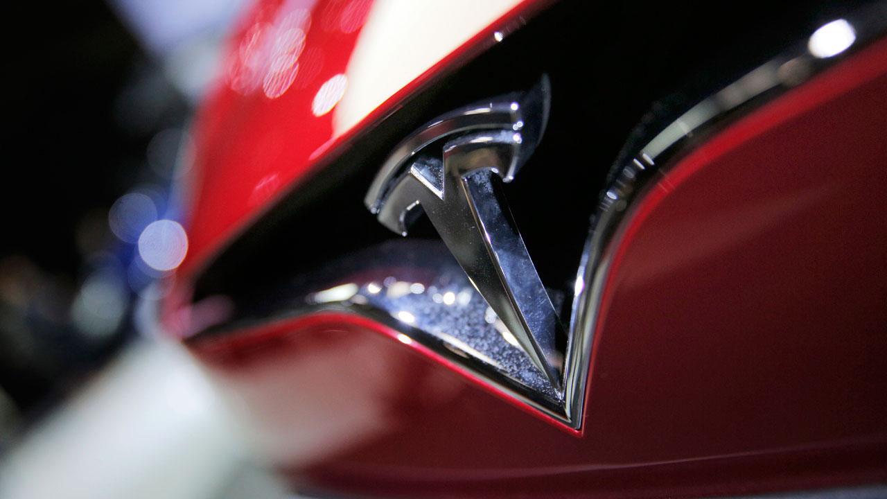 What is the timetable for Tesla's driverless cars?