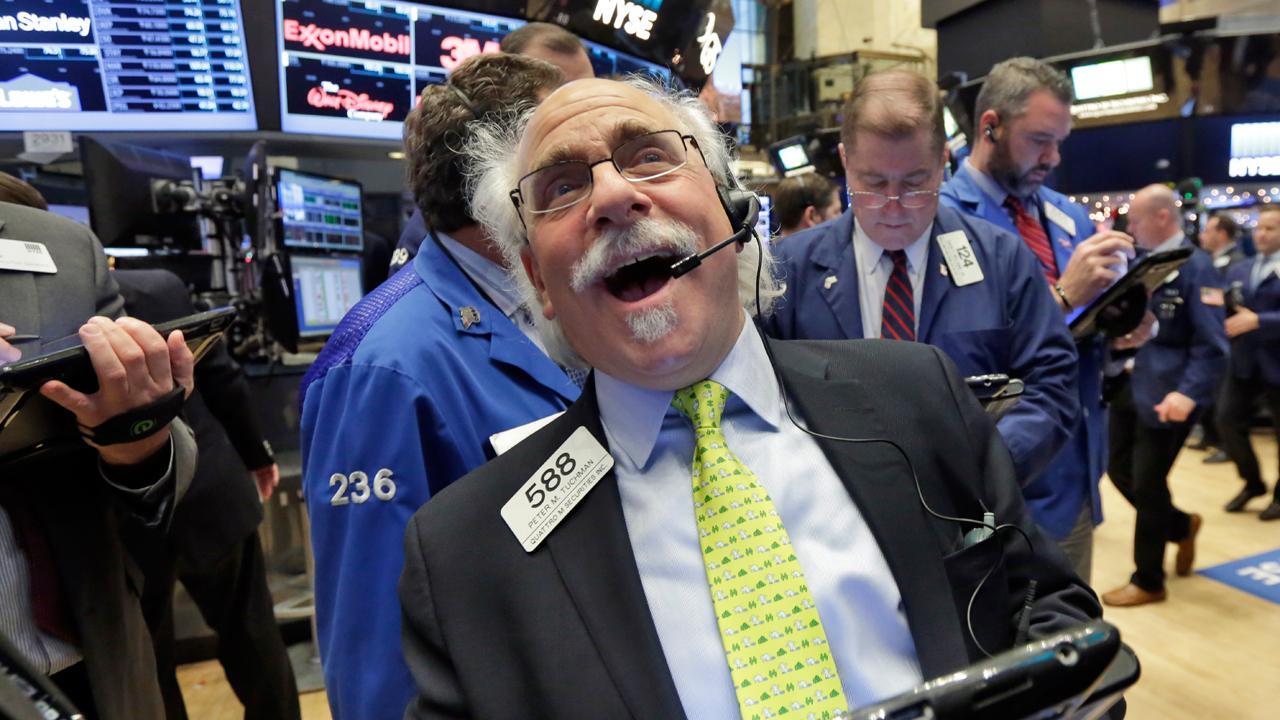 Stocks rally for the Dow’s best first week since 2006