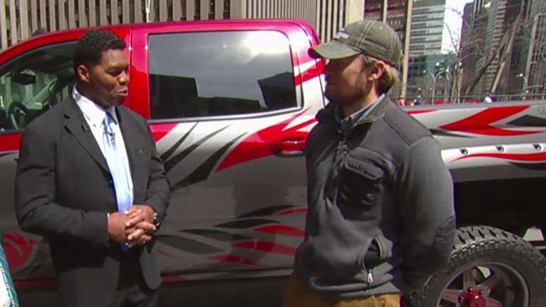 Herschel Walker presents veteran with custom truck