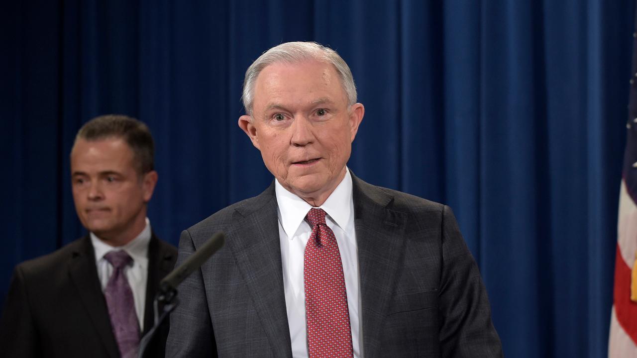Justice Department gives aid to 12 cities for crime fighting help
