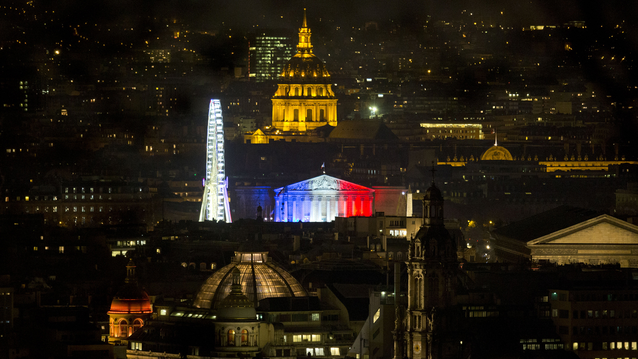 Mourners commemorate the  victims of Paris terror attacks