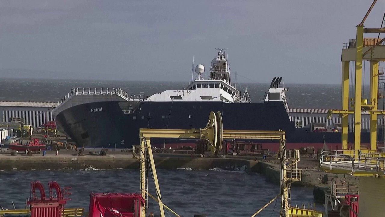 Twenty-five people were injured when a ship came off its holding and tipped on its side in a dry dock in Leith, Scotland, Wednesday, the Scottish Ambulance Service said, with 15 taken to hospital. (Reuters)