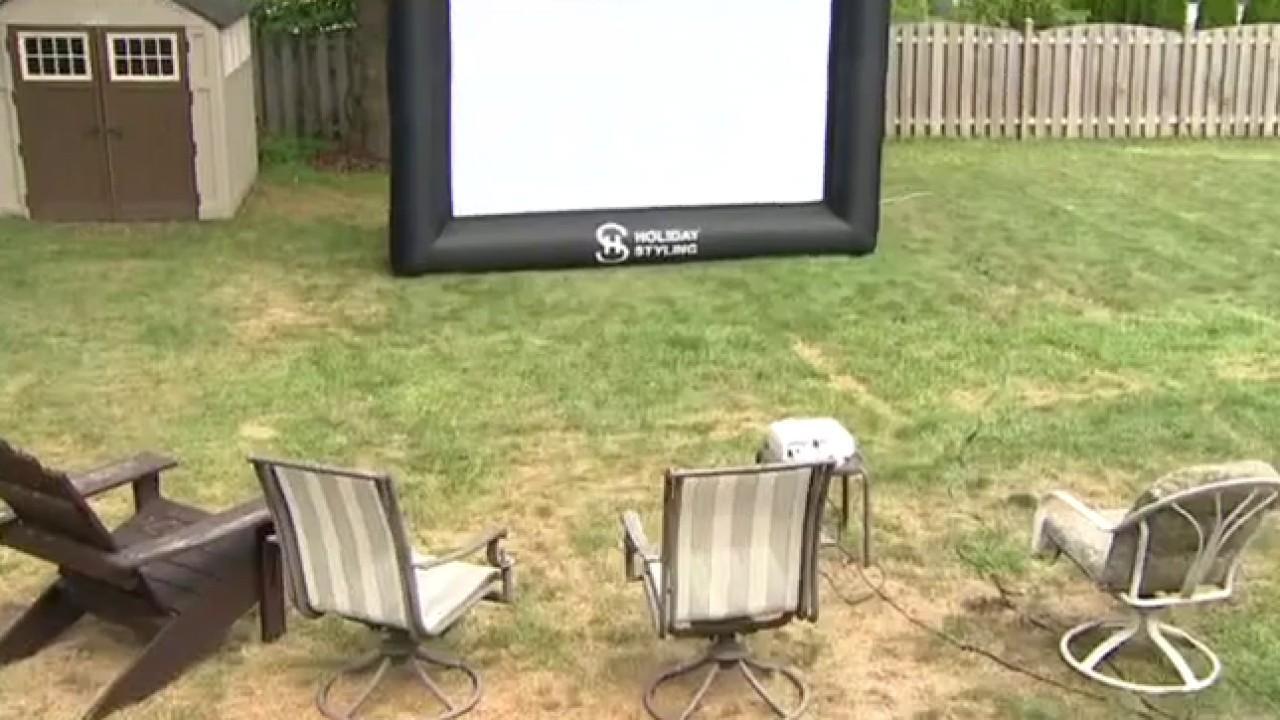 People elevating their at-home entertainment by building a backyard big screen