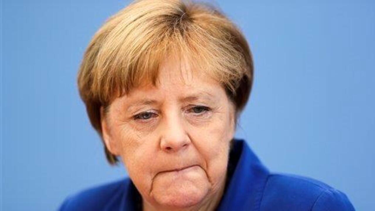 Did Merkel commit political suicide?