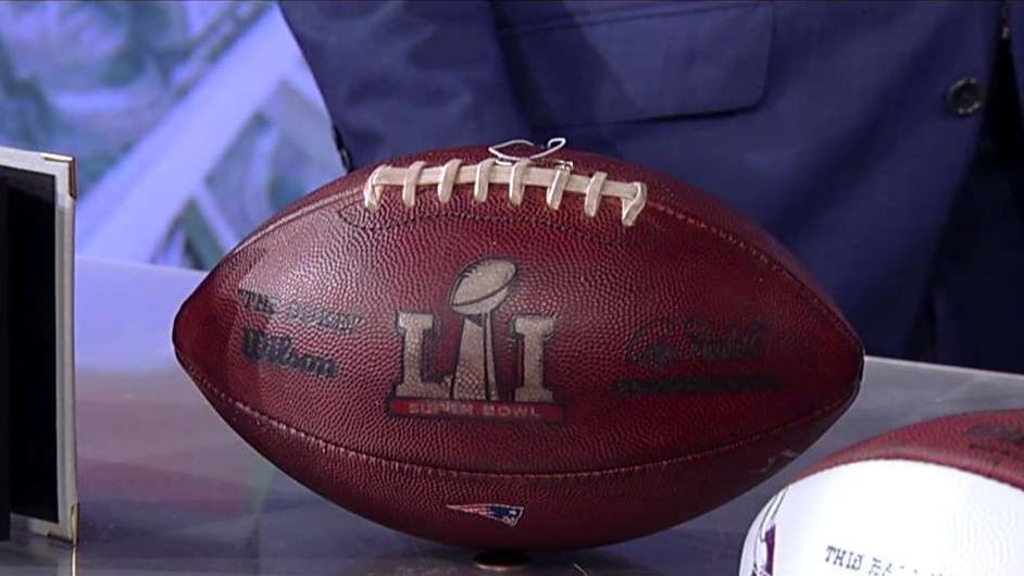 Tom Brady football part of Super Bowl memorabilia auction