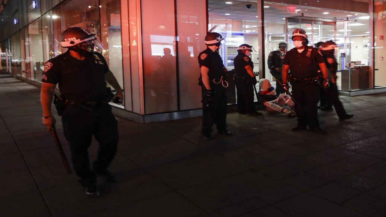 New York City police attacked during violent night of protests