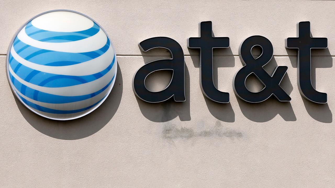 DOJ takes on AT&T-Time Warner deal