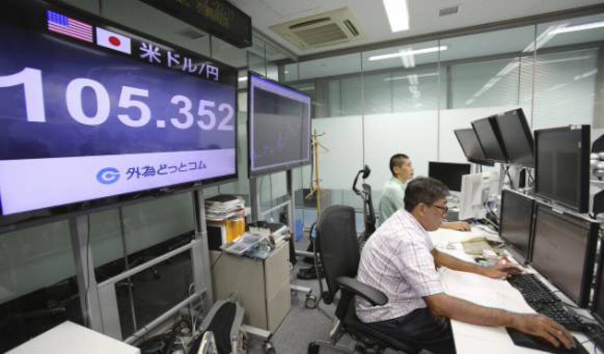 Asian markets mostly lower, Shanghai shares gain