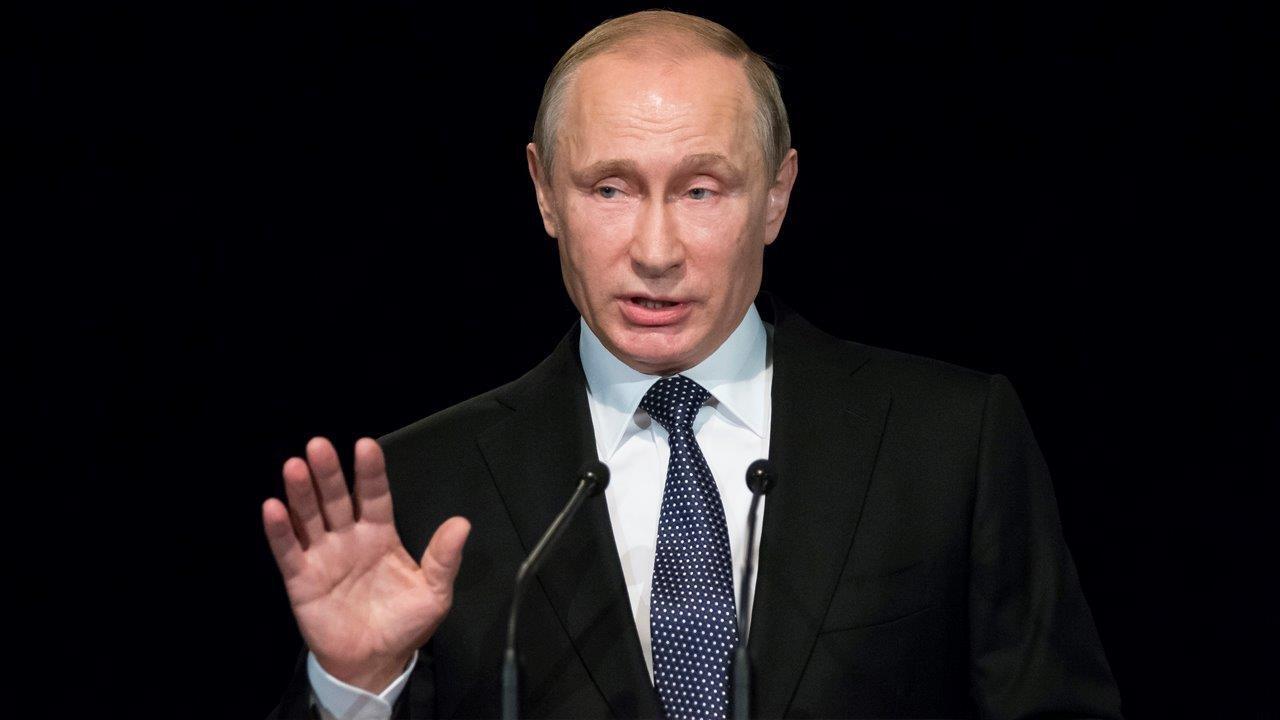 Putin accuses U.S. of spying?