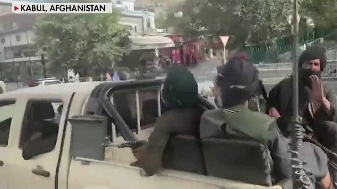 Reports coming in that Taliban is beating Americans outside of Kabul airport