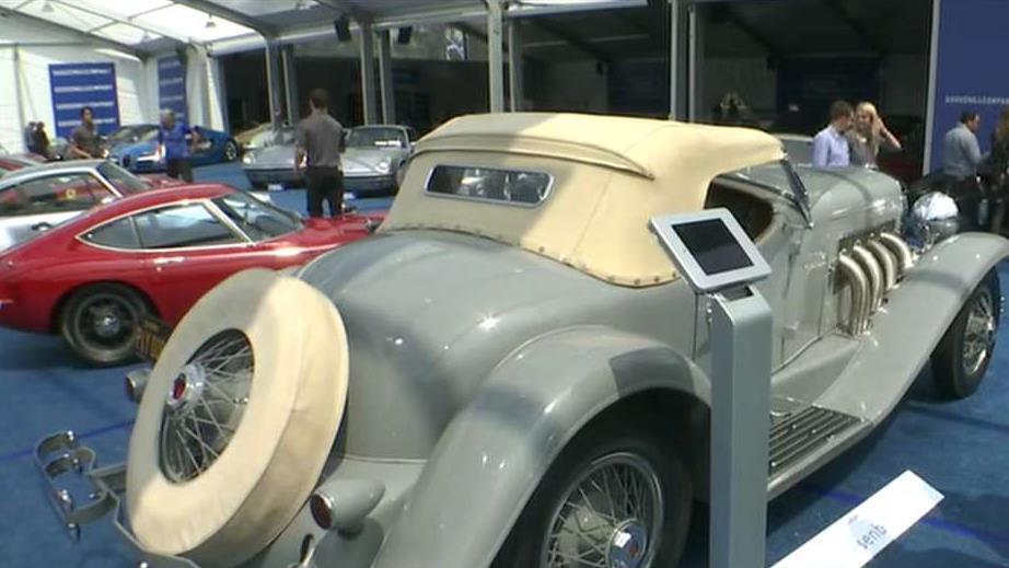 Classic cars go for multi-million dollars at the Concours d'Elegance auction