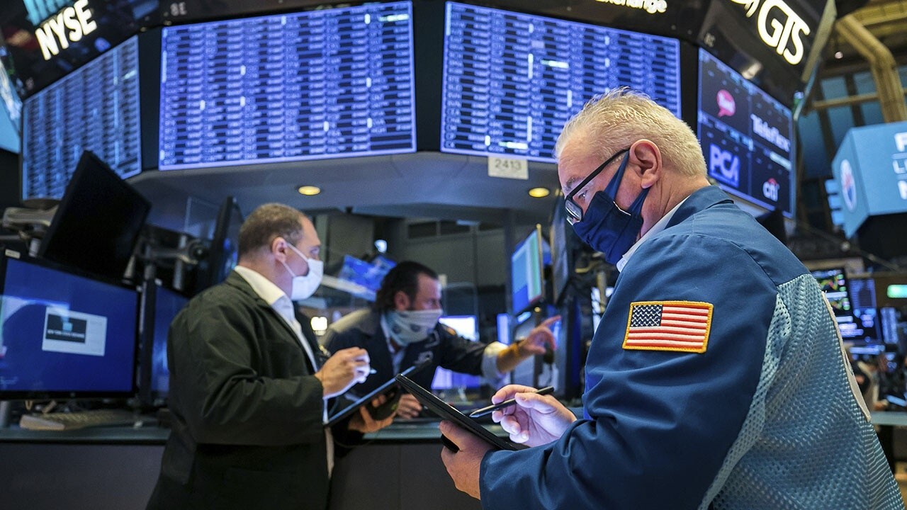 Stocks open in the red despite earnings topping expectations