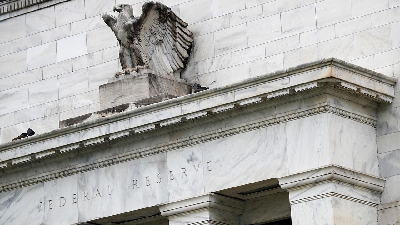 Boston Fed warns low rates could fuel recession 