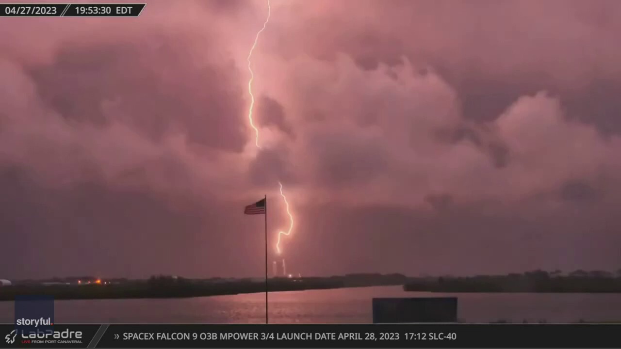 A lightning bolt struck a Kennedy Space Center launch complex in Florida Thursday, delaying a SpaceX launch. (@LabPadre via Storyful)