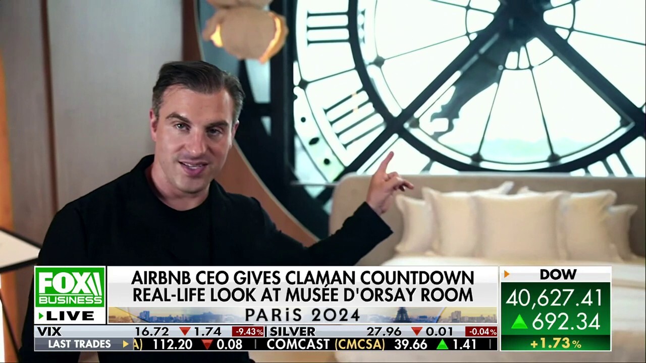 Airbnb CEO Brian Chesky shares the room, which includes a real Olympic torch, on 'The Claman Countdown.'